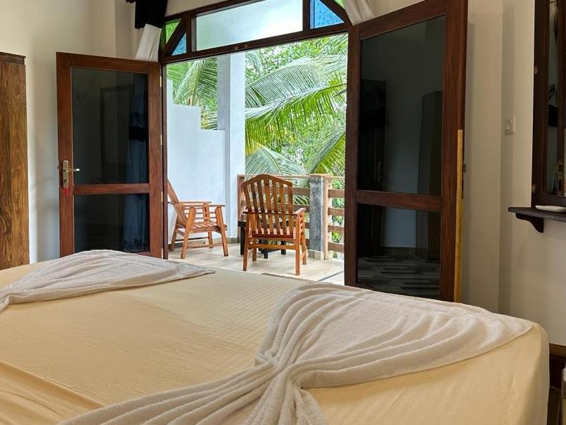 Siyon Yula - Guest House Hikkaduwa Buitenkant foto
